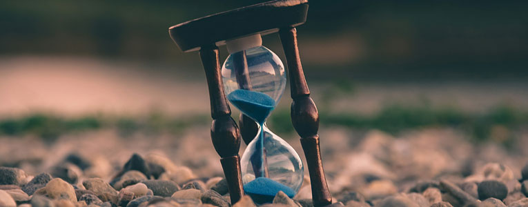 An hourglass time that symbolises the amount of time a credit check takes.